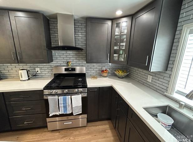 296 Yosemite Road San Rafael, CA 94903 - Photo 1 of 1 a kitchen with stainless steel appliances granite countertop a sink stove and cabinets