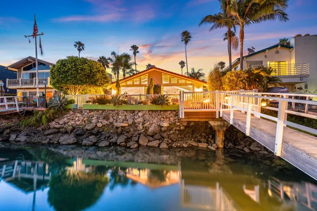 a swimming pool view with a lake view