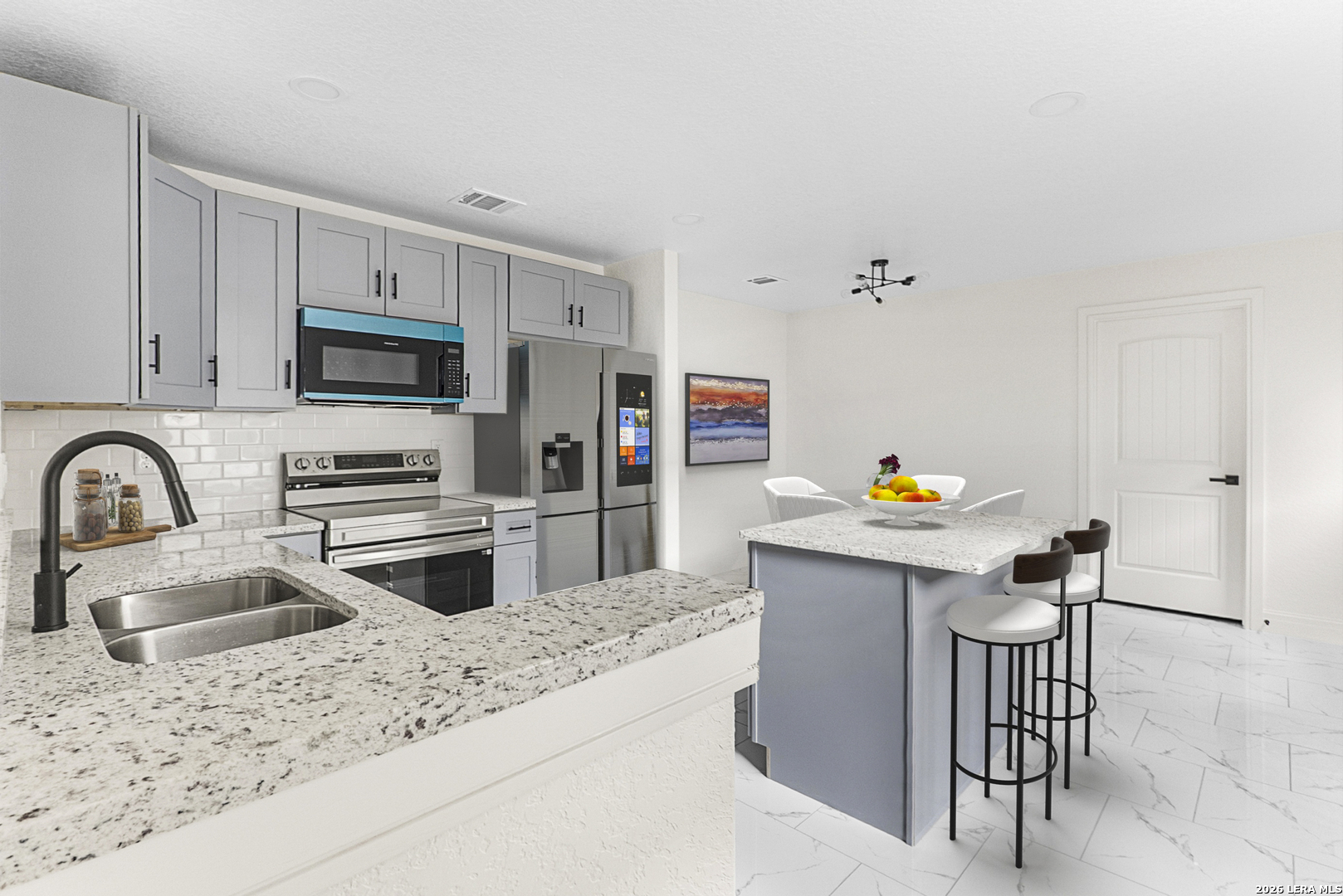 845 Tee Drive Spring Branch, TX 78070 - Photo 8 of 18 a kitchen with stainless steel appliances a stove a sink a microwave and cabinets