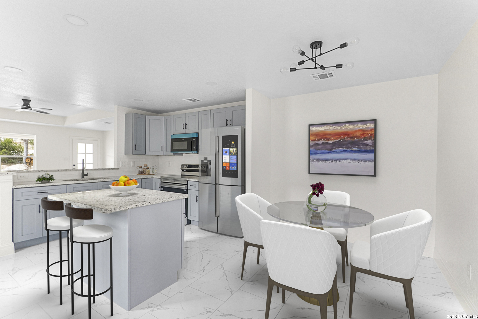 845 Tee Drive Spring Branch, TX 78070 - Photo 10 of 18 a kitchen with a dining table chairs and white stainless steel appliances
