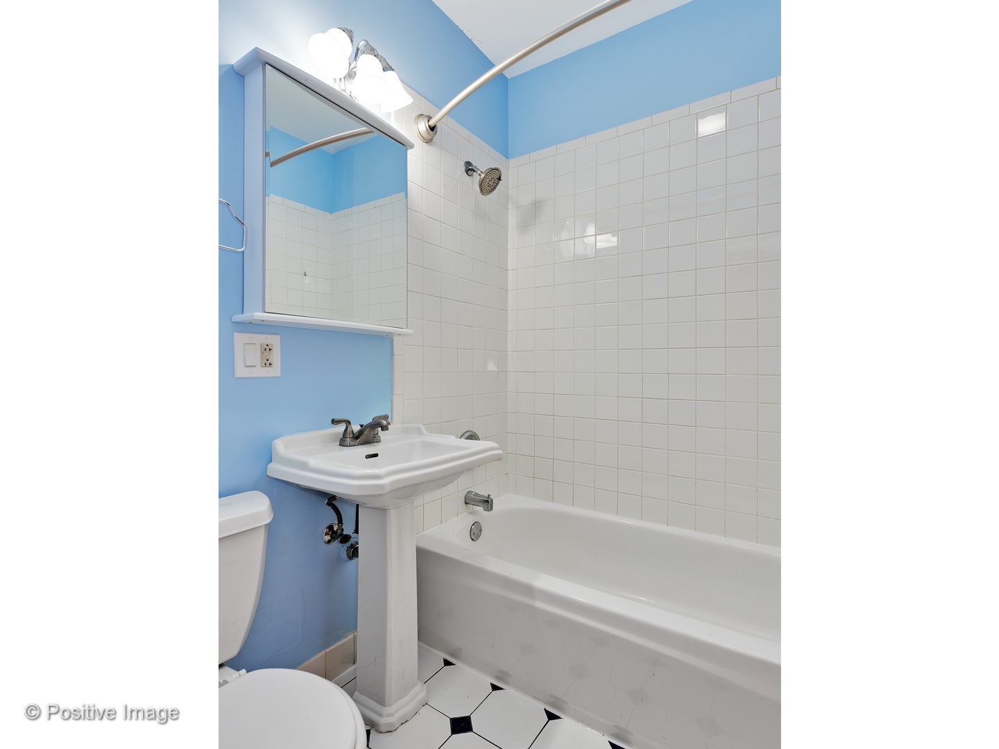 4417 North Racine Avenue, Unit 2N Chicago, IL 60640 - Photo 18 of 22 a bathroom with a sink a toilet and a bathtub