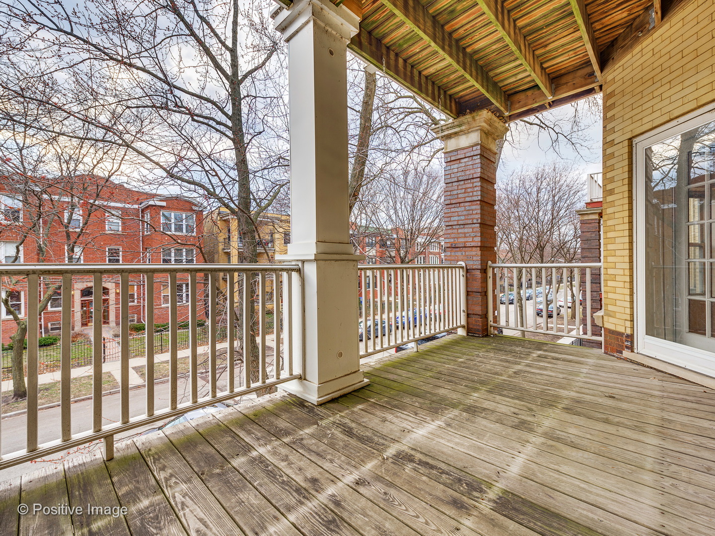4417 North Racine Avenue, Unit 2N Chicago, IL 60640 - Photo 21 of 22 a view of a balcony with a floor to ceiling window