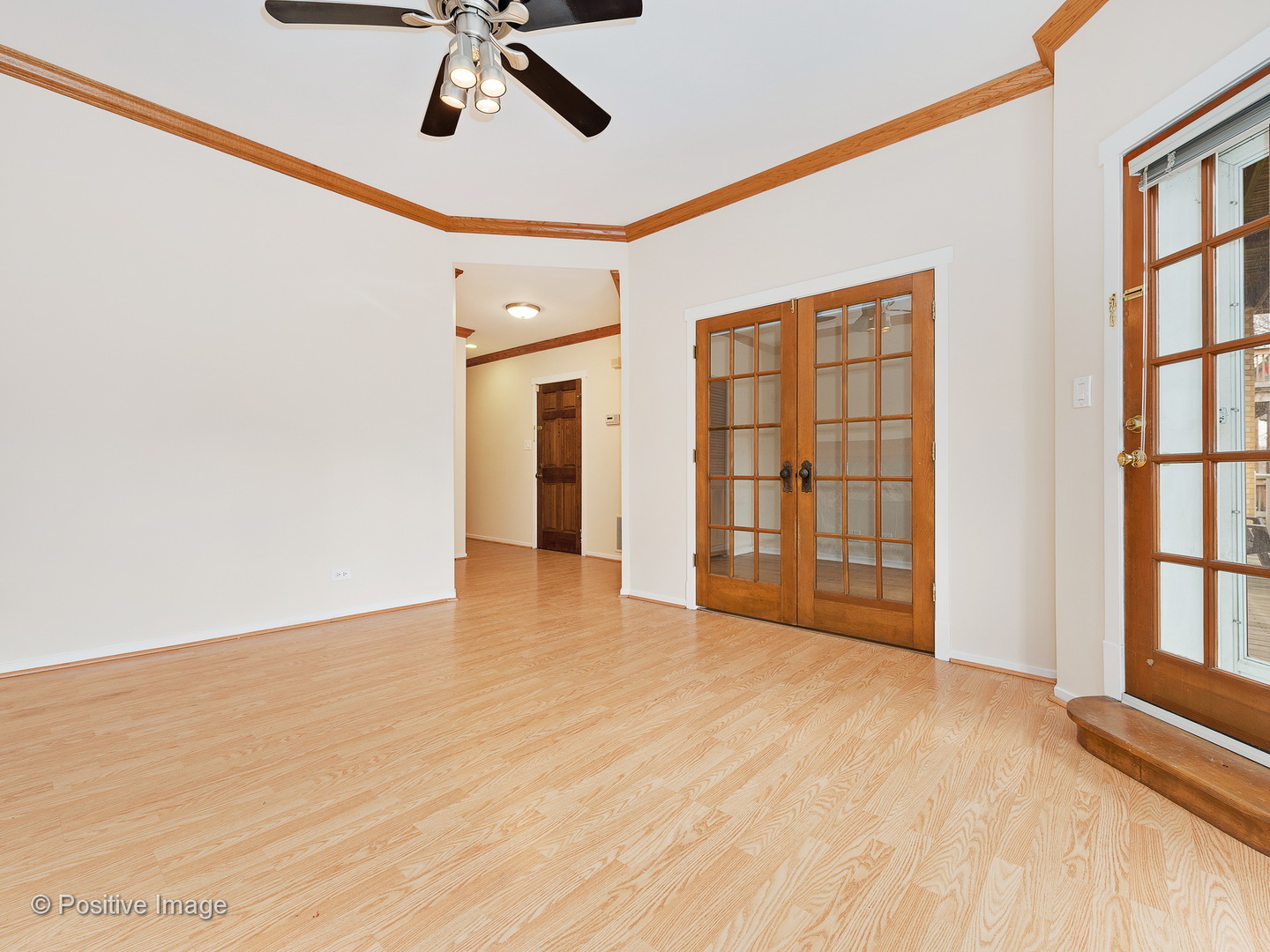 4417 North Racine Avenue, Unit 2N Chicago, IL 60640 - Photo 5 of 22 a view of an empty room with a window