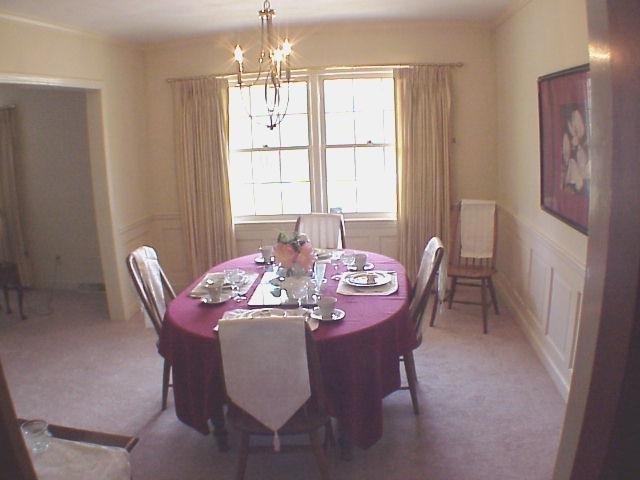 4521 Rosecrest Road Roanoke, VA 24018 - Photo 21 of 27 a dining room with furniture a chandelier and window