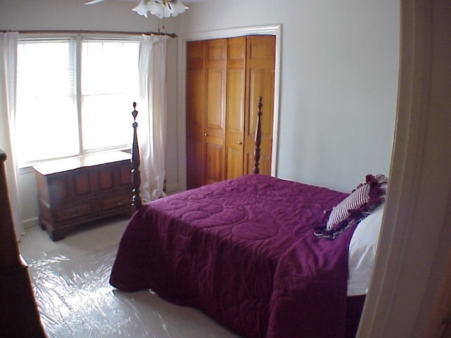 4521 Rosecrest Road Roanoke, VA 24018 - Photo 23 of 27 a bedroom with a bed and window