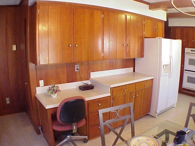 4521 Rosecrest Road Roanoke, VA 24018 - Photo 4 of 27 a kitchen with a refrigerator a stove a sink and a refrigerator