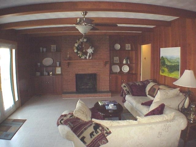 4521 Rosecrest Road Roanoke, VA 24018 - Photo 5 of 27 a living room with furniture and a fireplace