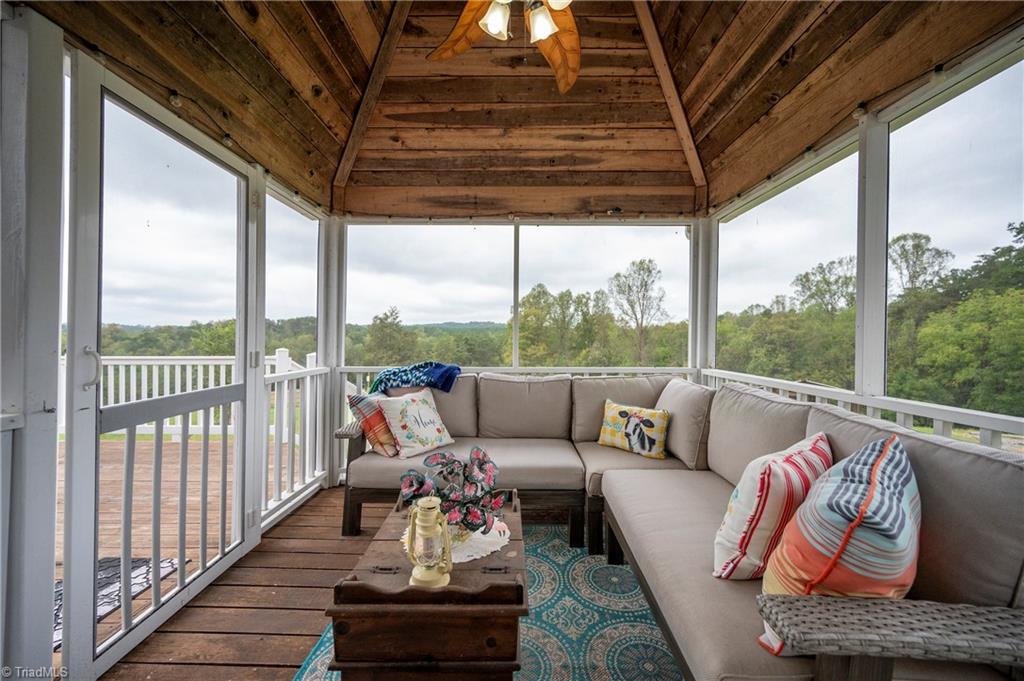 338 Nichols Road Pilot Mountain, NC 27041 - Photo 30 of 48 Screened porch offers a cozy retreat!