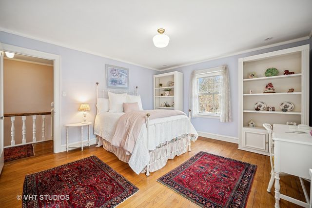 a bed room with a bed and a window