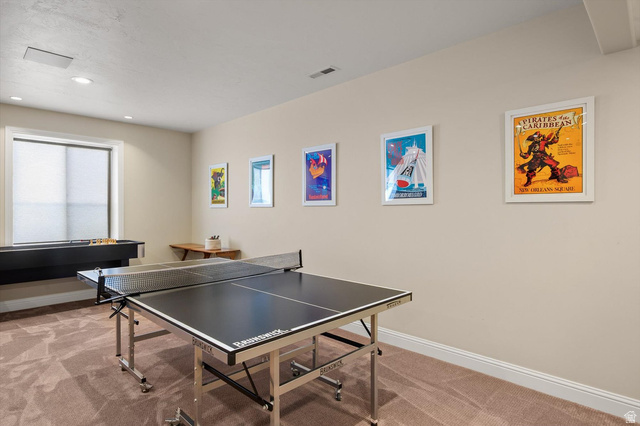 1456 Firelight Way Sandy, UT 84092 - Photo 15 of 22 Playroom with light carpet and recessed lighting