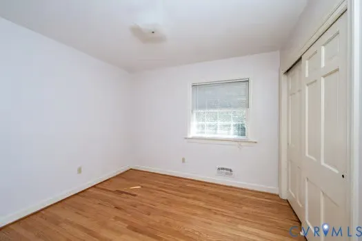 a view of a chairs and table in backyard