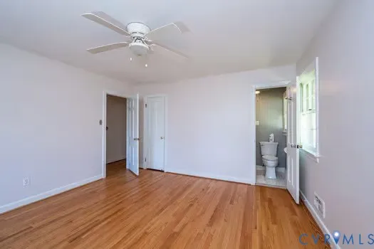 a backyard of a house with yard and outdoor seating