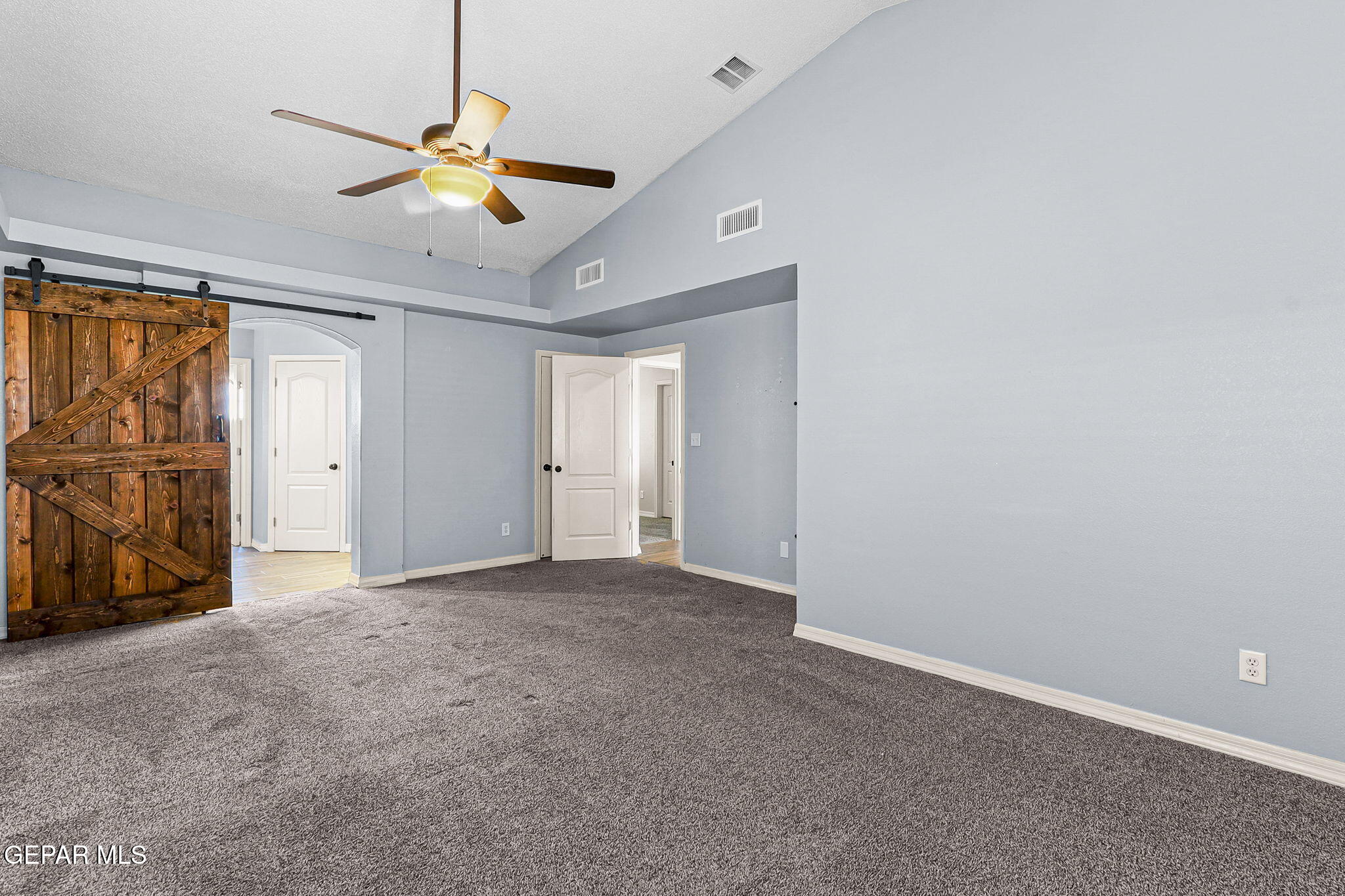 14045 Tower Point Way El Paso, TX 79938 - Photo 24 of 46 an empty room with closet and windows