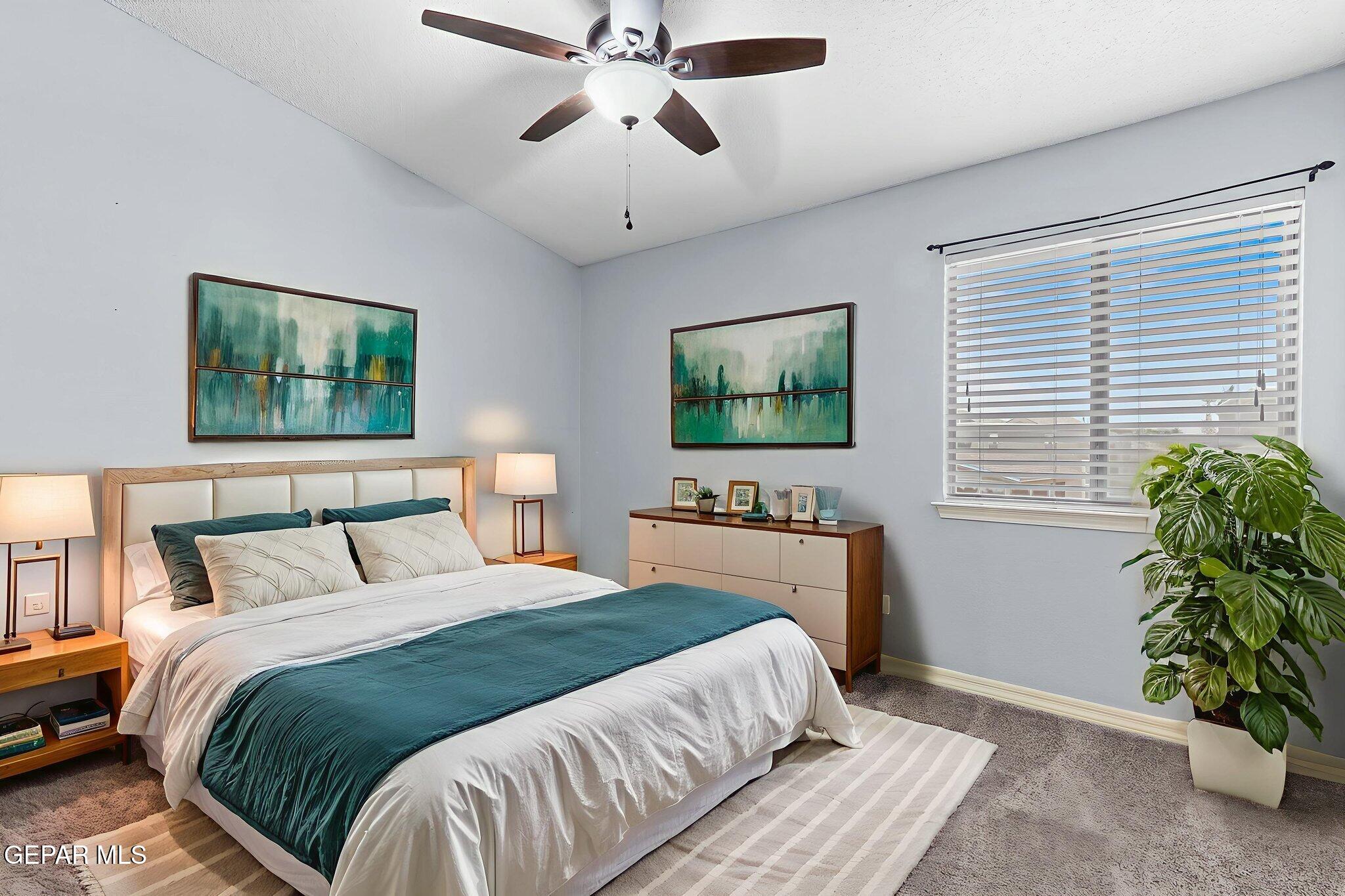 14045 Tower Point Way El Paso, TX 79938 - Photo 31 of 46 a bedroom with a bed and a window