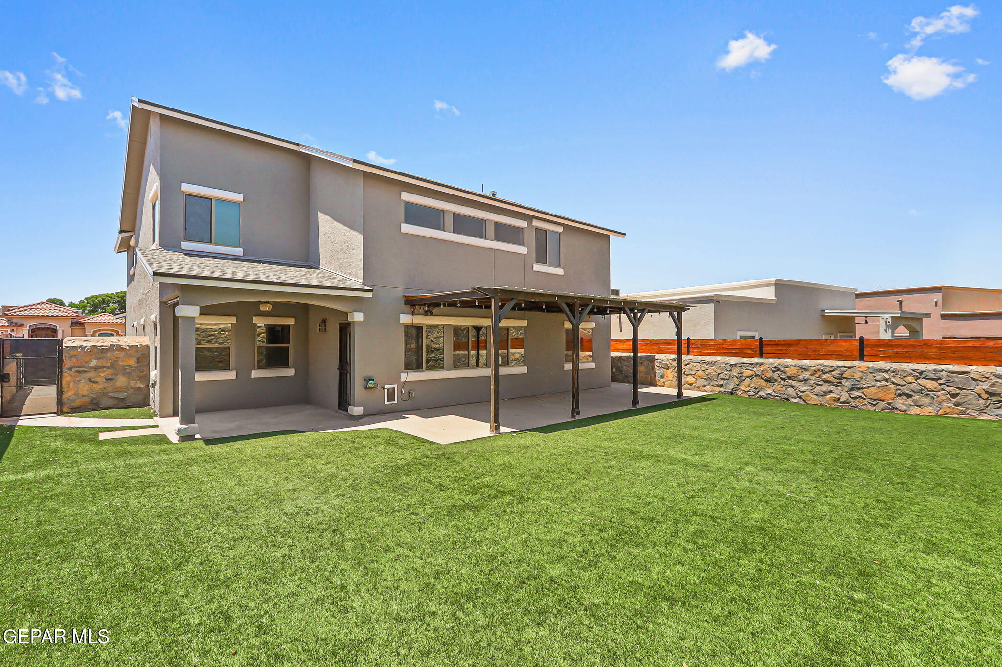 14045 Tower Point Way El Paso, TX 79938 - Photo 39 of 46 a view of house with backyard and porch