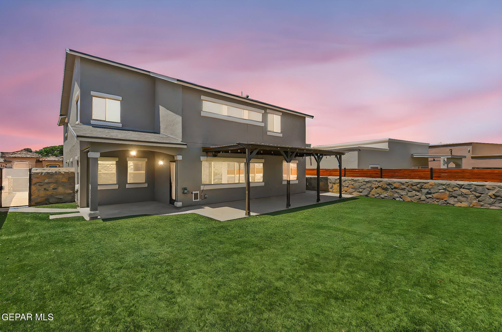 14045 Tower Point Way El Paso, TX 79938 - Photo 40 of 46 a view of a house with a yard and a large tree