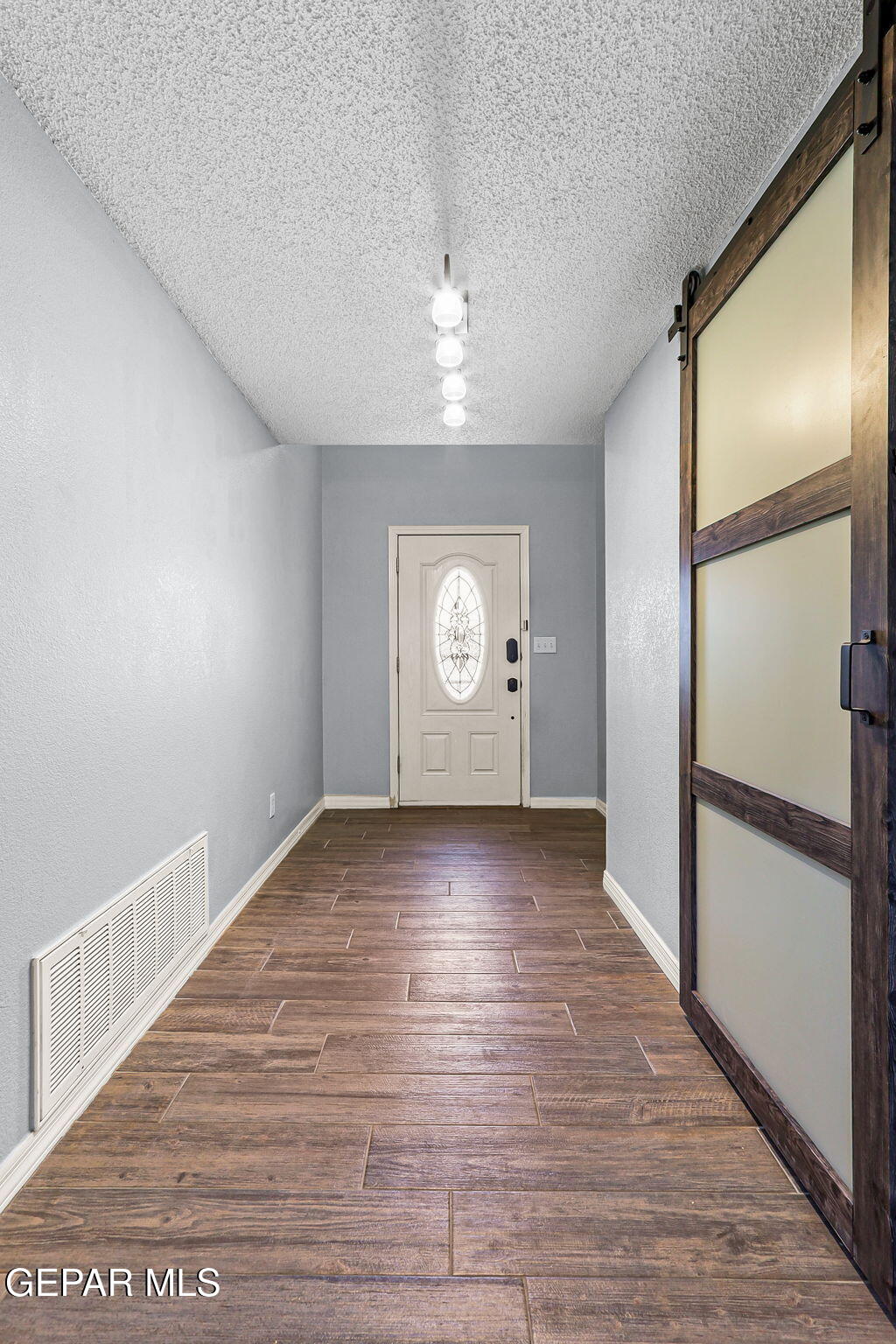 14045 Tower Point Way El Paso, TX 79938 - Photo 5 of 46 a view of an empty room with a window