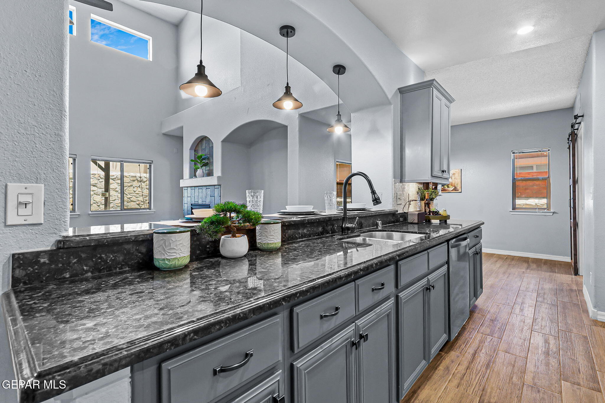 14045 Tower Point Way El Paso, TX 79938 - Photo 9 of 46 a kitchen with lots of counter space and a sink