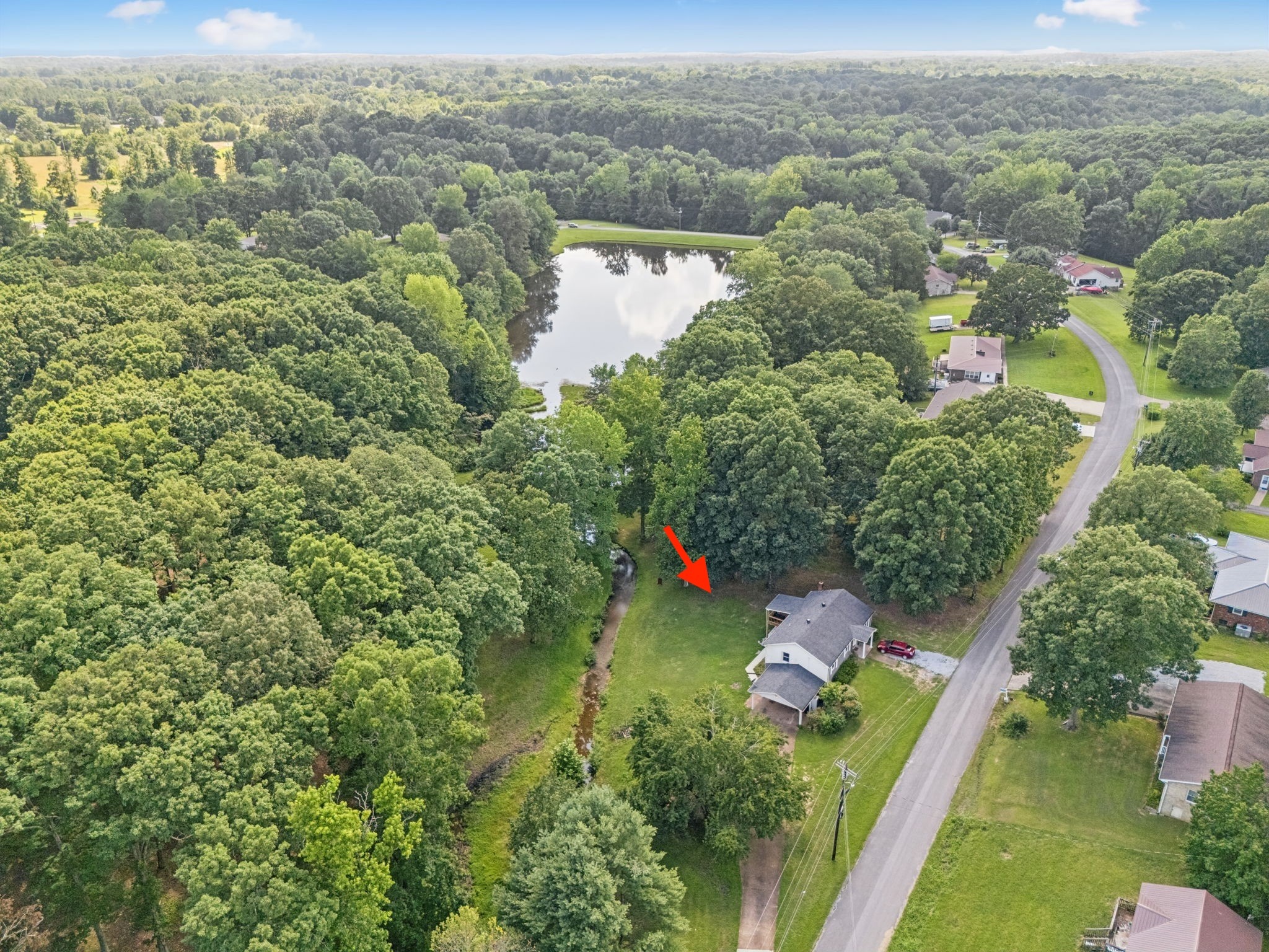 630 Lakeview Court Tennessee Ridge, TN 37178 - Photo 22 of 33 an aerial view of a house with a yard