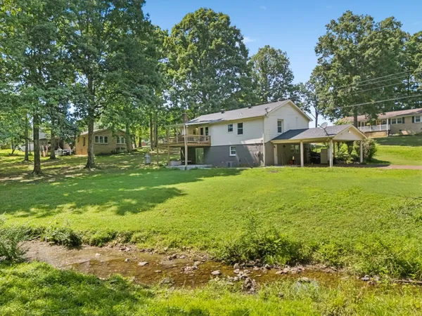 a house view with a garden space