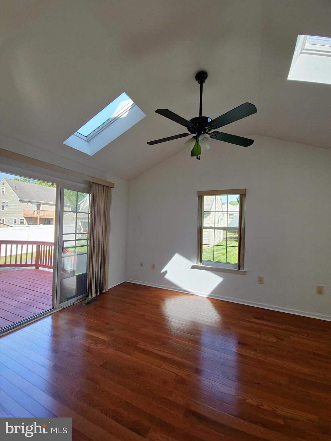 1119 Secane Road Secane, PA 19018 - Photo 5 of 15 a view of an empty room with wooden floor and a window