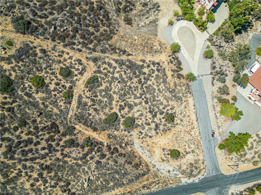 21436 Ridgedale Drive Lake Mathews, CA 92570 - Photo 11 of 13 a bathroom with a shower curtain