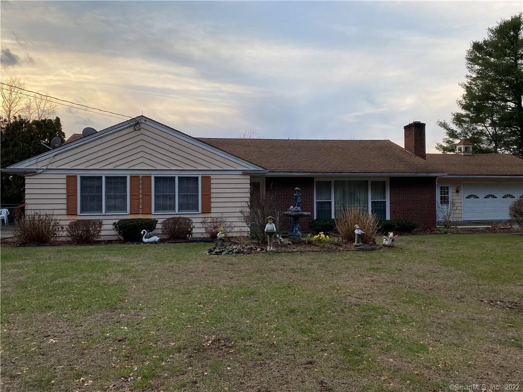 51 Jerusalem Road Windham, CT 06280 - Photo 1 of 1 a front view of a house with a garden