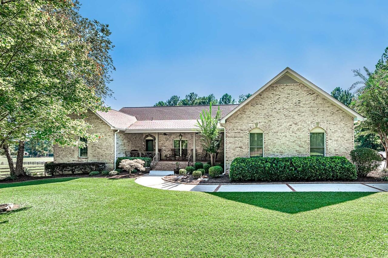 1670 Turner Road Williamson, GA 30292 - Photo 1 of 1 a view of a house with backyard and porch