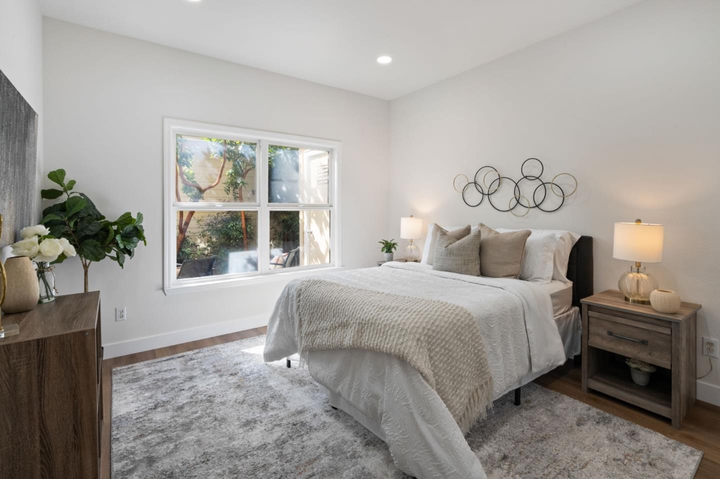 729 Cottage Court Mountain View, CA 94043 - Photo 16 of 41 a bedroom with a bed and a window