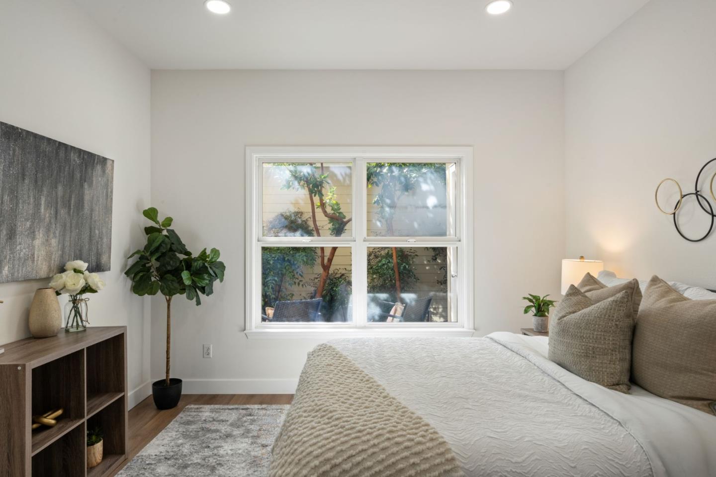 729 Cottage Court Mountain View, CA 94043 - Photo 18 of 41 a bed sitting in a bedroom next to a window