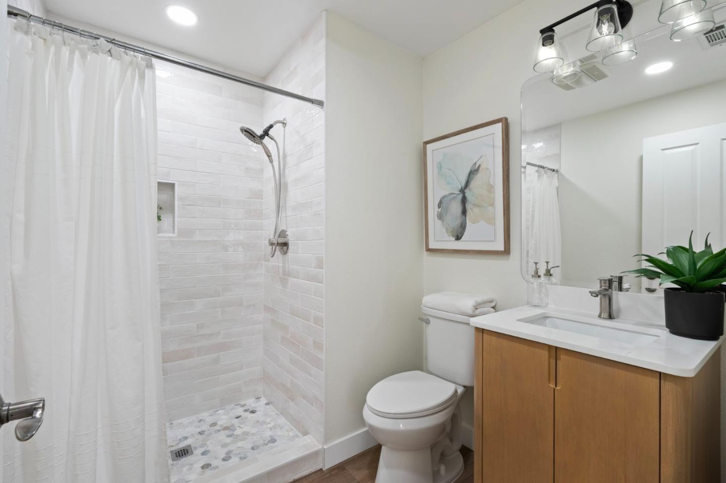 729 Cottage Court Mountain View, CA 94043 - Photo 19 of 41 a bathroom with a sink toilet and shower