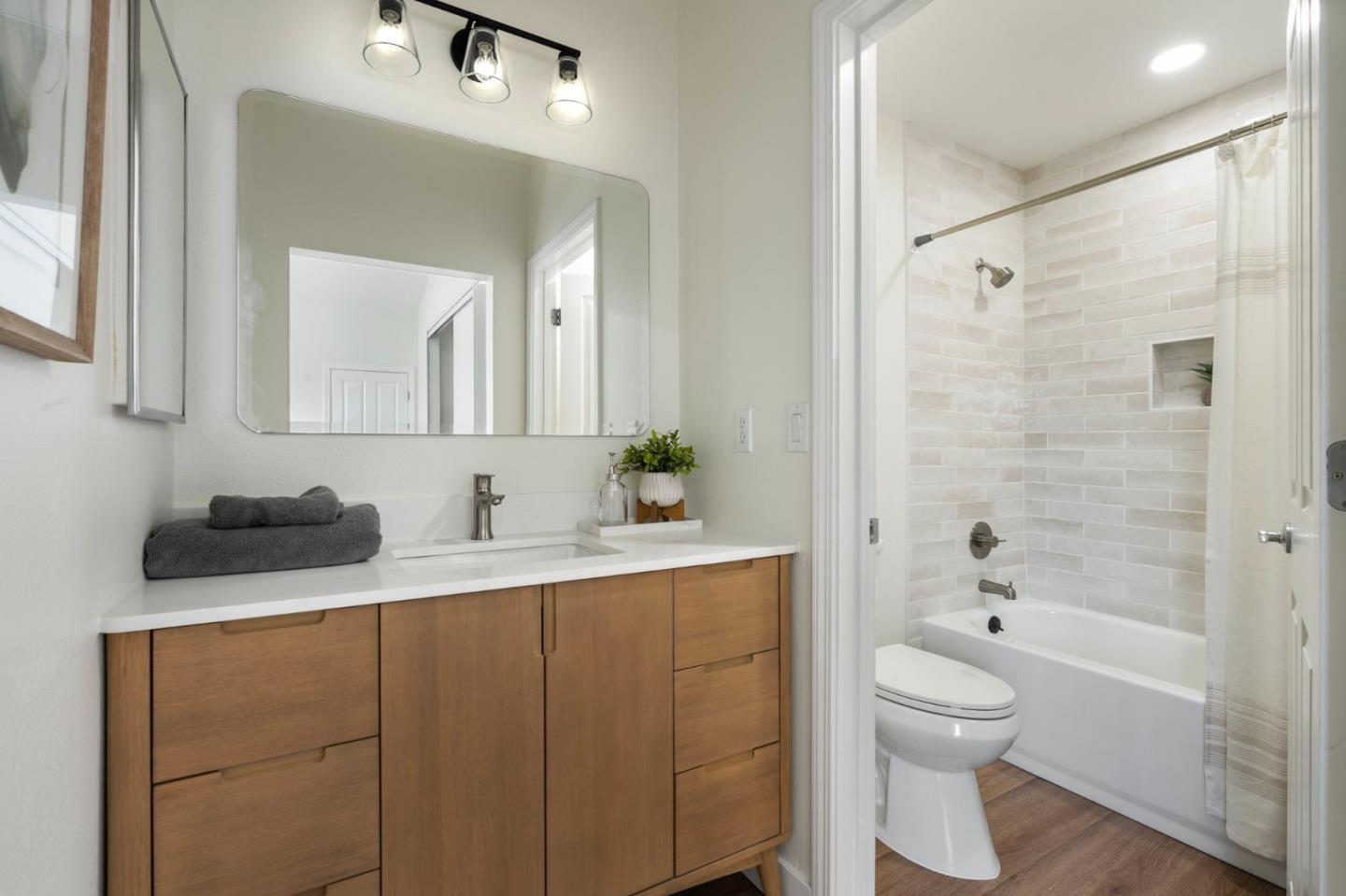 729 Cottage Court Mountain View, CA 94043 - Photo 27 of 41 a bathroom with a granite countertop sink toilet and shower
