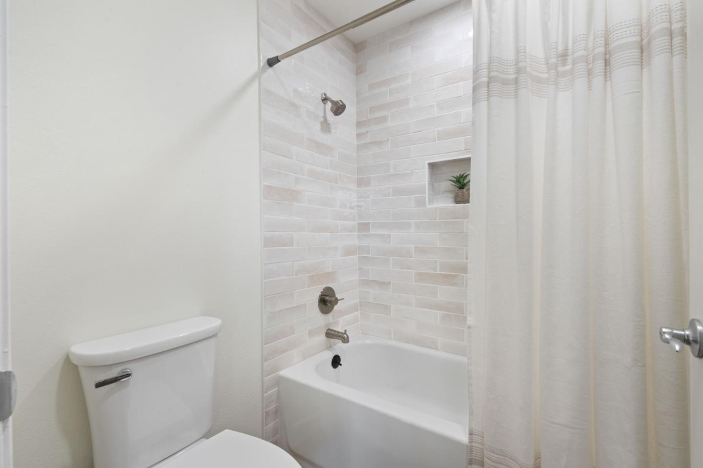 729 Cottage Court Mountain View, CA 94043 - Photo 28 of 41 a bathroom with a shower and a toilet