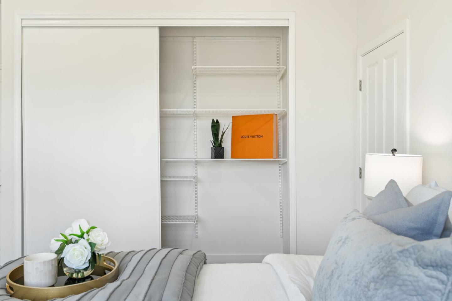 729 Cottage Court Mountain View, CA 94043 - Photo 31 of 41 a living room with a couch and a potted plant