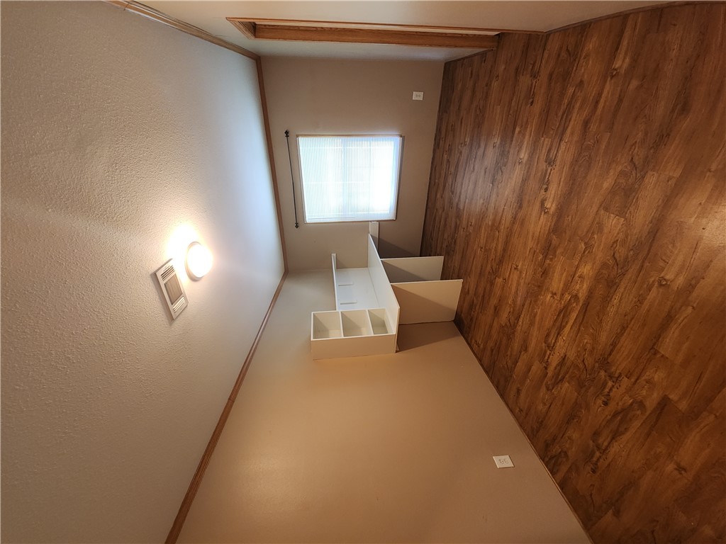 3738 Smetana Road Bryan, TX 77807 - Photo 22 of 29 wooden floor in an empty room with a window