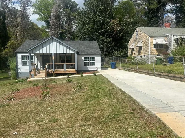 front view of a house with a yard
