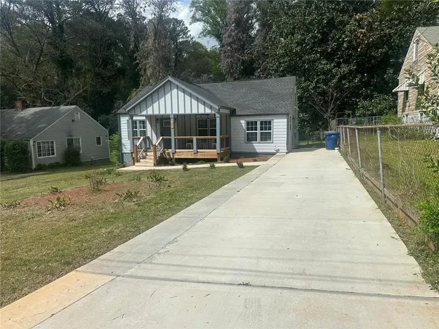 a view of house with outdoor space area