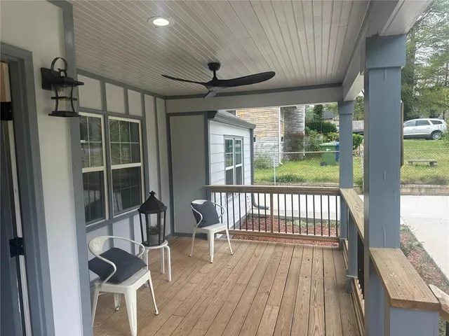 a view of balcony with wooden floor and outdoor space