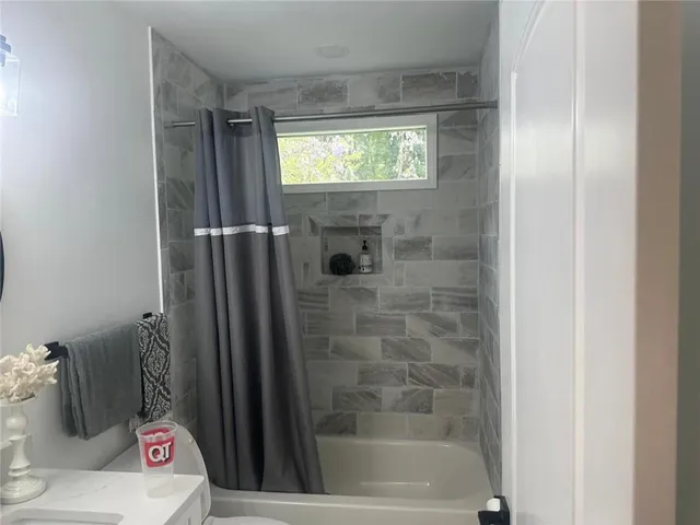 a bathroom with a bathtub