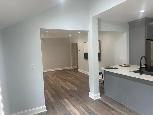 a view of a bathroom from a hallway