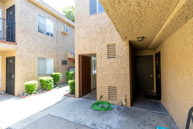 a front view of a house with a porch