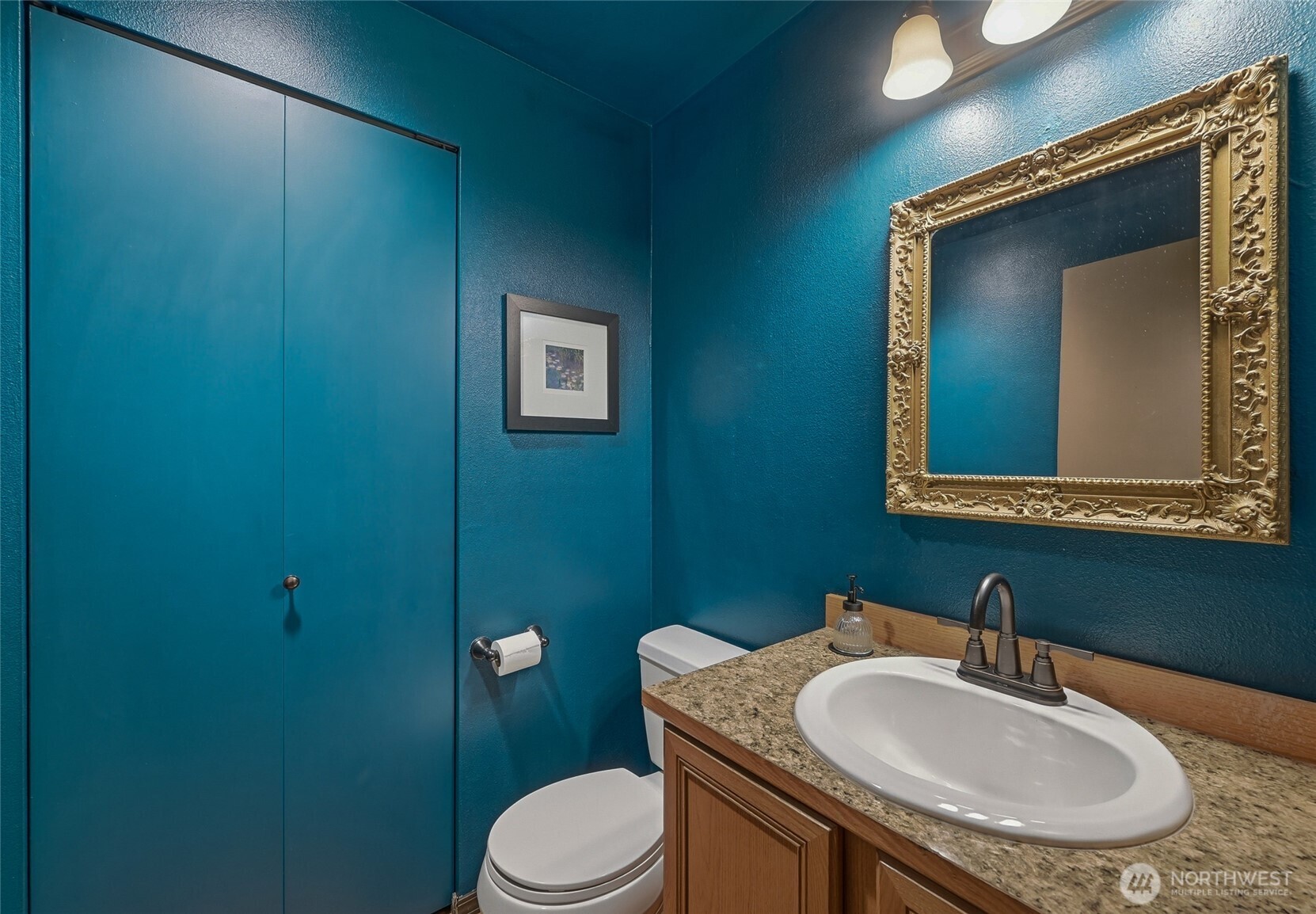 2120 185th Place Southeast Bothell, WA 98012 - Photo 14 of 30 a bathroom with a toilet sink and mirror