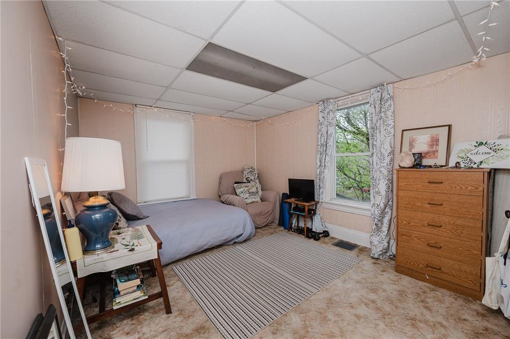 242 North 10th Street Indiana, PA 15701 - Photo 14 of 18 a bedroom with a bed and furniture
