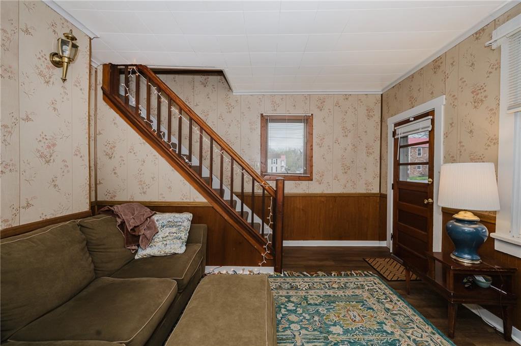 242 North 10th Street Indiana, PA 15701 - Photo 10 of 18 a living room with furniture and a rug