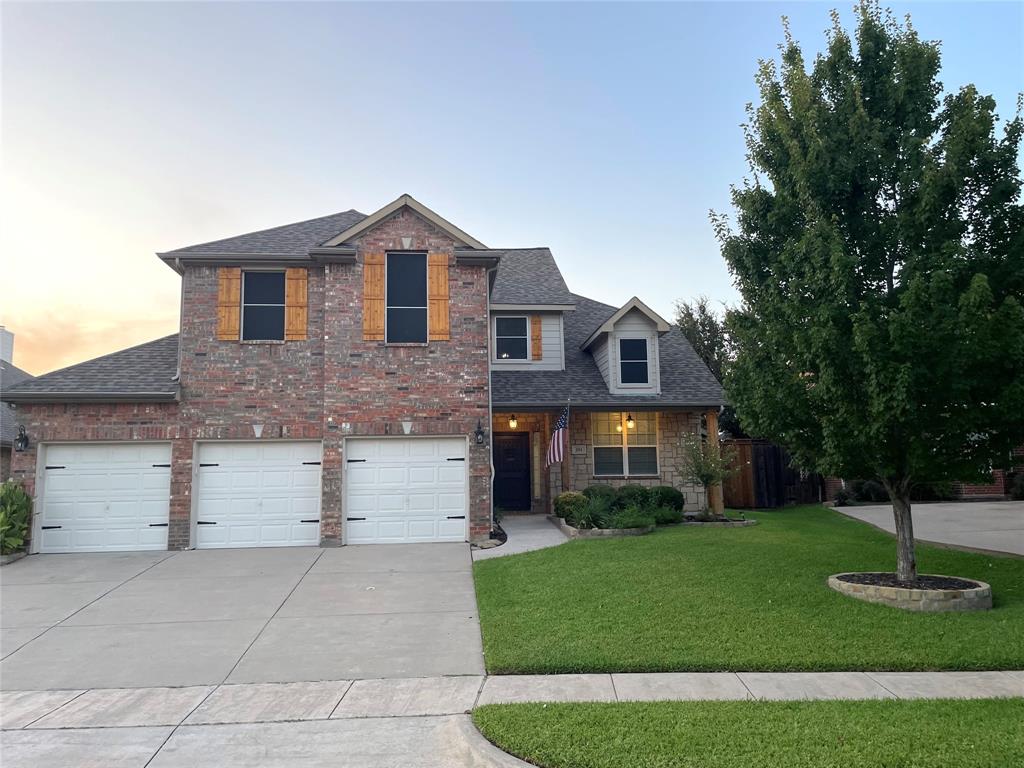 1711 Goshawk Lane Corinth, TX 76210 - Photo 1 of 1 a front view of a house with a yard