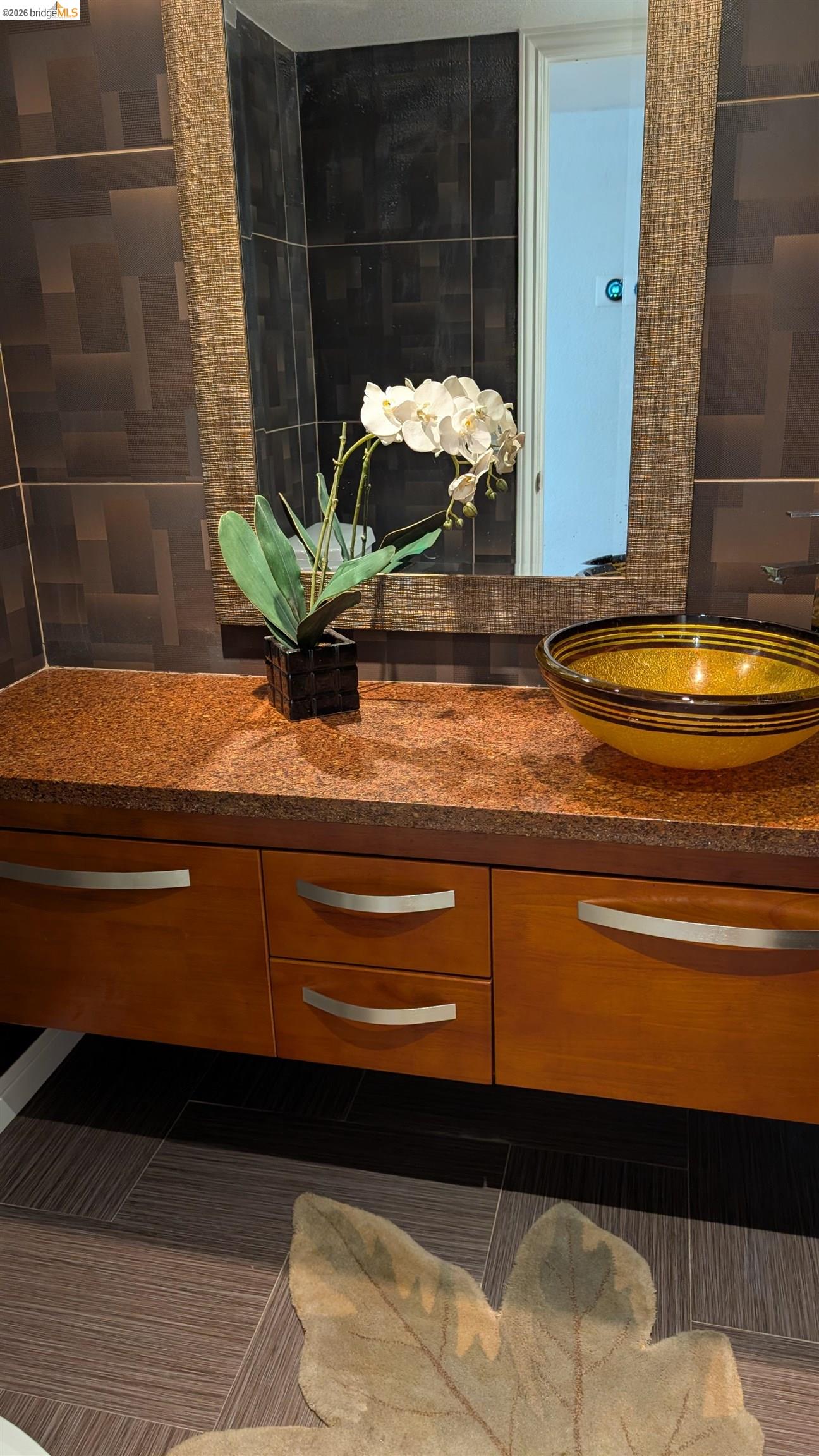 10013 Foxboro Circle San Ramon, CA 94583 - Photo 22 of 45 a bathroom with a sink and a mirror