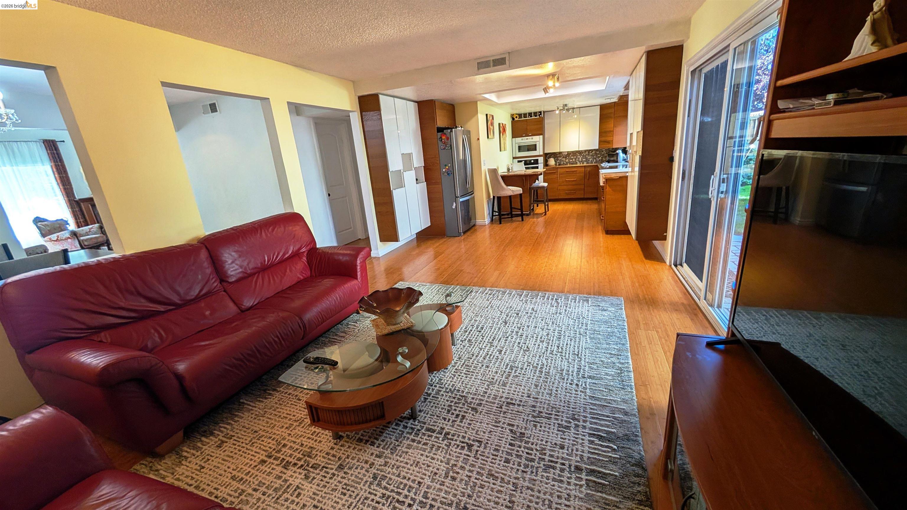 10013 Foxboro Circle San Ramon, CA 94583 - Photo 6 of 45 a living room with furniture and a fireplace