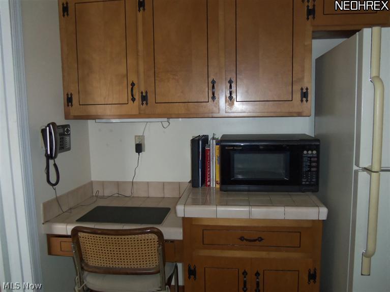 8257 Johnnycake Ridge Road Mentor, OH 44060 - Photo 5 of 25 Desk corner in kitchen