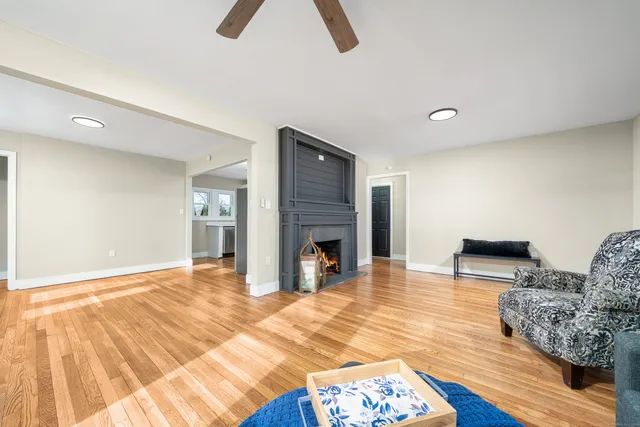 a view of livingroom with furniture and fireplace