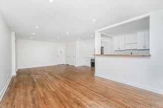 9201 Shore Road, Unit C209 Brooklyn, NY 11209 - Photo 11 of 23 a view of kitchen and wooden floor